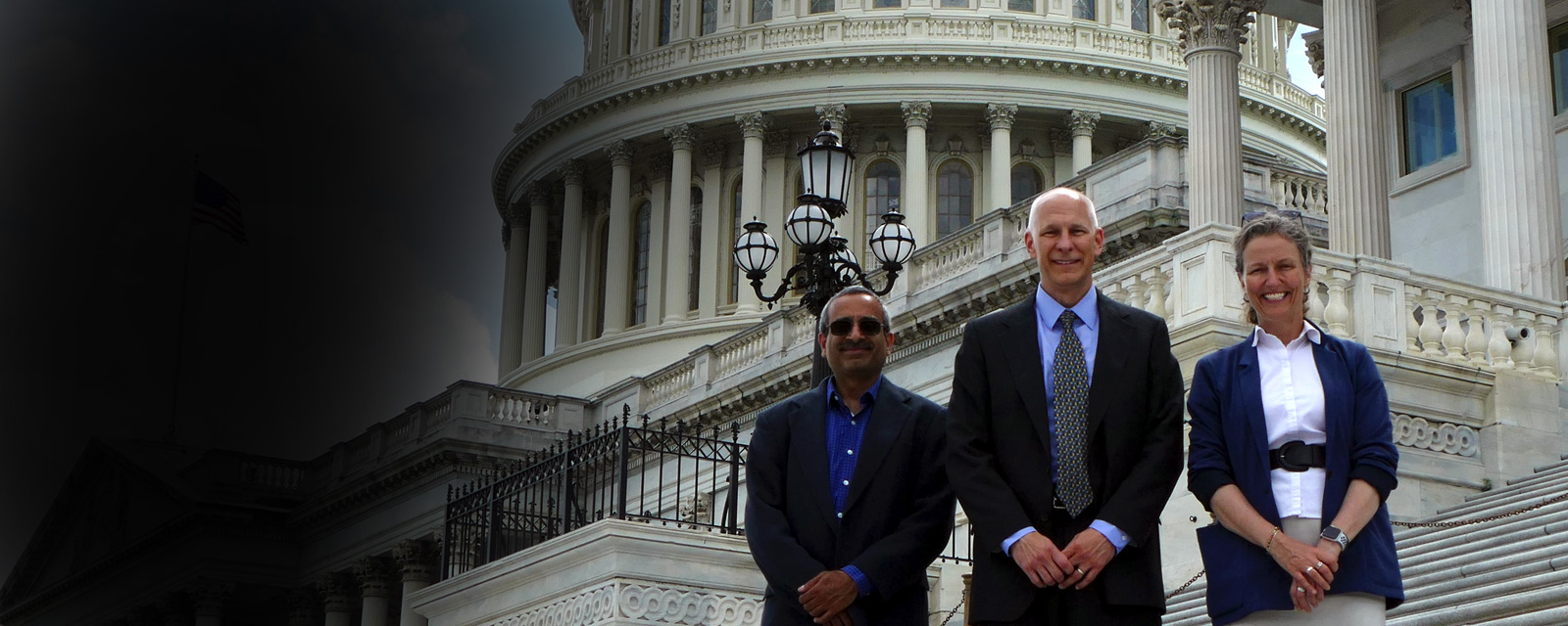 3 APS Members (Narayanan Parameswaran, BVSc, PhD, Ed Dzialowski, PhD, and Laura McCabe PhD) smiling in front of the U.S. Capitol Building