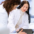 Researcher working in an APS member's lab