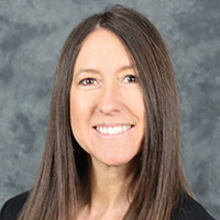 a professional photo of Erica Wehrwein, PhD