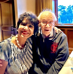 Usha Raj, MD, MHA, FAPS, and John Clements, MD, smile at the camera