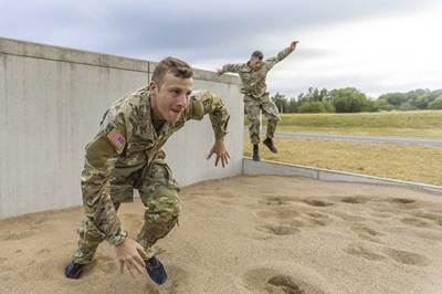 Army Reserve Sgt. Conner Williams trains on an obstacle course. Army Reserve Sgt. Conner Williams trains on an obstacle course.